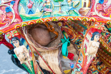 Fototapeta premium Closeup view of a colorful detail of a typical sicilian cart