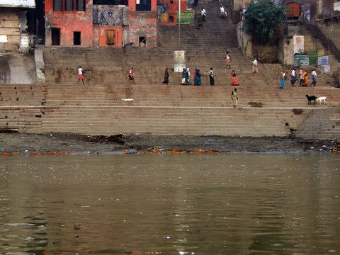 Hindus Perform Ritual Puja At Dawn In The Ganges River