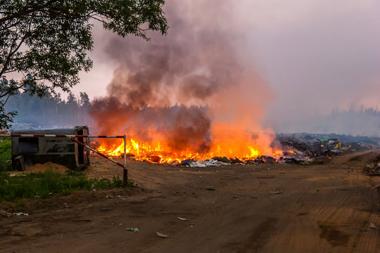 Burning garbage in the landfill solid waste. Fire.