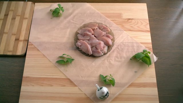 Chicken fillet. Preparation of pizza on an unleavened wheat cake with chicken fillet.