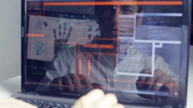 double exposure shot of man hacker with glasses working at computer