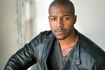 Handsome masculine manly male model macho strong stare biker style african american