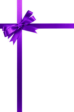 Purple bow gift ribbon cross shape frame border isolated on white background for birthday or christmas present decoration design photo vertical