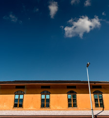 Windows on brown concrete wall