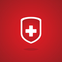 Obraz premium First aid shield icon isolated