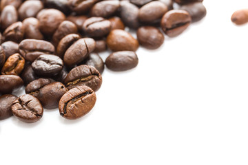  Roasted coffee beans on white
