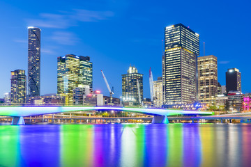 Fototapeta na wymiar Illuminated bridge and skyscrapers in Brisbane