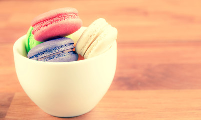 Colorful macaroon on vintage background