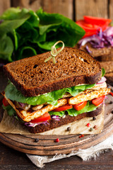 vegan sandwich with tofu and vegetables