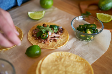 making tacos at home in kitchen