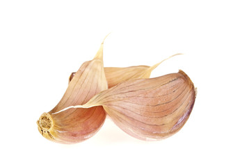 Obraz premium Three garlic cloves isolated on white background