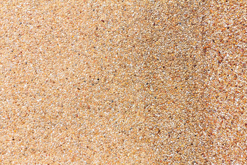 Small sand stone of sand wall texture or sand wall background for design with copy space for text or image.