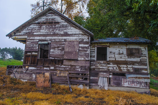Delapidated old houses along highway 160 in California
