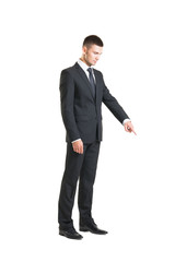 Young and confident businessman on white