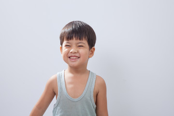 Little asian boy very happy looking at camera portrait