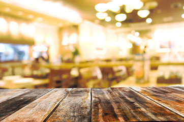 Empty wooden table in hotel room blur background.