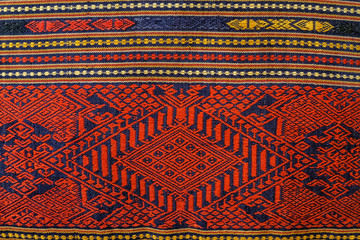 Colorful peruvian style rug surface close up. More of this motif