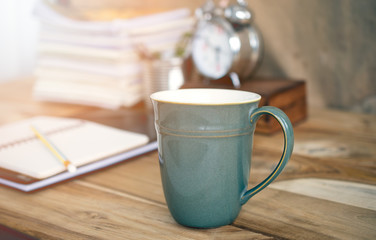  business table with a cup of coffee.