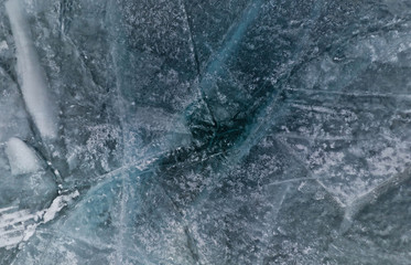 Texture of cracks on the gray-blue ice of Lake Baikal