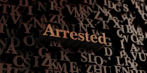 Arrested - Wooden 3D rendered letters/message.  Can be used for an online banner ad or a print postcard.