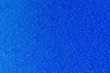 Obraz premium water drop on blue background