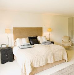 Interior of white and gray cozy bedroom