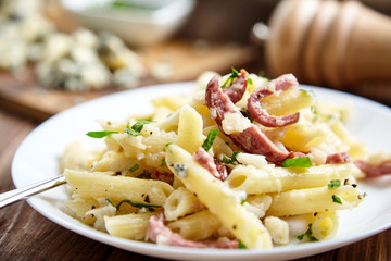 Pasta of Penne rigate, celery and smoked sausage