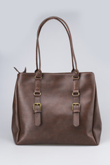 Brown Leather Woman Bag On White