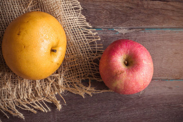 pear on wooden table.