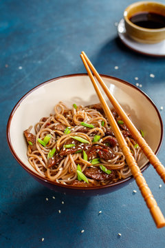 Buckwheat soba noodles with beef and sesame.