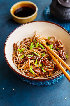 Fried noodles yakisoba with beef in a bowl