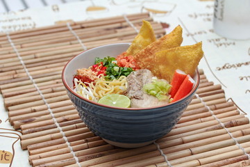Close up of Japanese noodle (ramen) in spicy sour soup as 