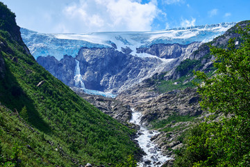 Fototapeta na wymiar Looking up the canyon to Folgefonna Glacier in Hardanger Norway