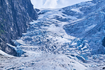 The very blue and very cracked ice cap at the foot of the Folgefonna Glacier in Hardanger Norway
