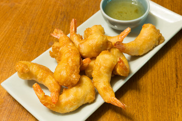 fried prawn balls on wooden table