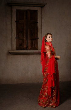 Girl at the image of Turkish sultan's wife