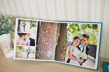 Fototapeta na wymiar open page at wedding photobook and album