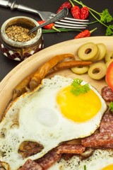 Fried Eggs on a plate. A hearty breakfast for athletes. Healthy food.
