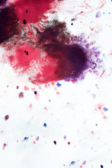 Abstract background of blots pink, red and maroon on white paper