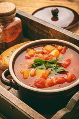 Hot bean soup with bacon and vegetables.