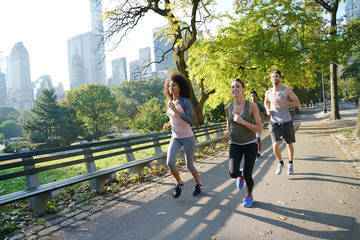 Group of joggers exercising at Central park, NYC - obrazy, fototapety, plakaty