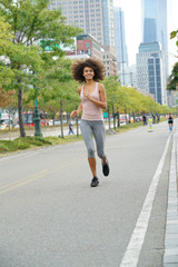 Young woman jogging in South Manhattan