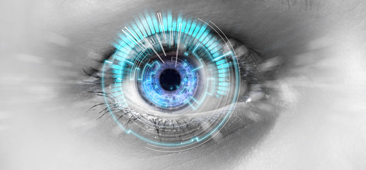 Eye of a woman with digital interface in front of it