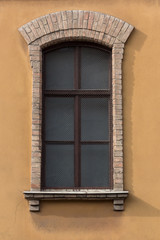 Retro looking window with brick frame