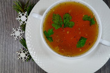 Traditional broth served at Christmas dinner - energy and warming meal on a cold day
