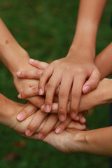 Group of people joining hand together