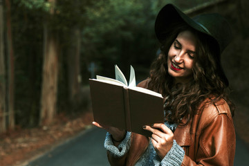 reading a book outdoors