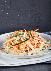 Coleslaw salad on white plate
