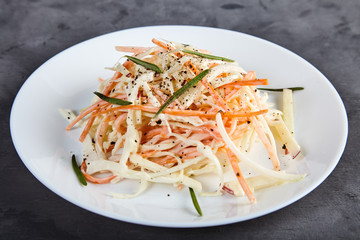 Coleslaw salad on white plate
