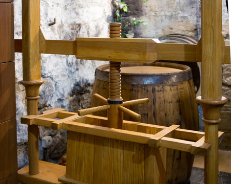 Ancient wooden press to produce grape juice